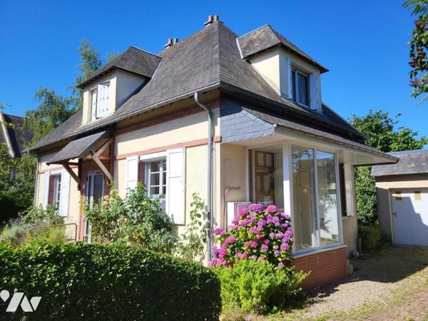 PROXIMITÉ COMMERCES / MAISON D'HABITATION AVEC JARDIN