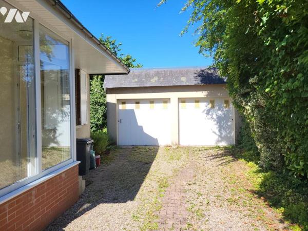 PROXIMITÉ COMMERCES / MAISON D'HABITATION AVEC JARDIN