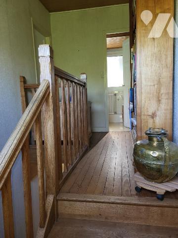 PROXIMITÉ COMMERCES / MAISON D'HABITATION AVEC JARDIN