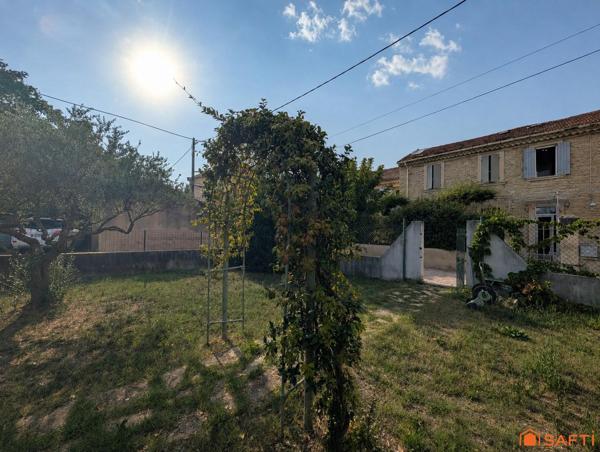 Maison de ville,avec jardin et garage