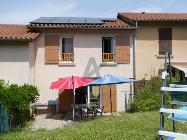 Maison de village avec garage et jardin