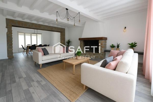 Maison 5 chambres, 27 garages, 8700 m² de terrain.