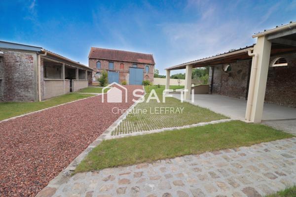 Maison 5 chambres, 27 garages, 8700 m² de terrain.