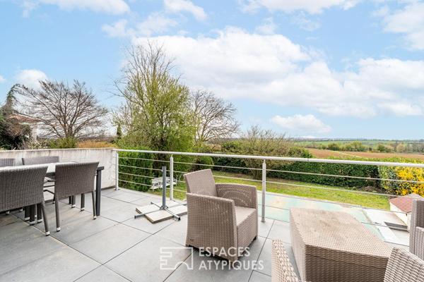 Maison au fond d’une impasse avec piscine