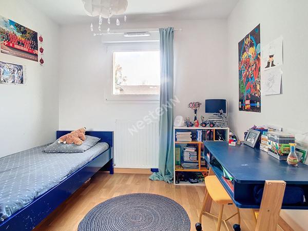 Appartement 4 pièces de 90 m² situé sur Annecy-Le-Vieux, avec une spacieuse terrasse, un jardin, un garage et une cave