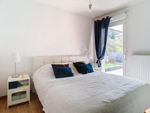 Appartement 4 pièces de 90 m² situé sur Annecy-Le-Vieux, avec une spacieuse terrasse, un jardin, un garage et une cave