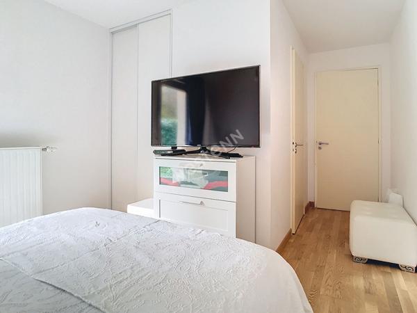 Appartement 4 pièces de 90 m² situé sur Annecy-Le-Vieux, avec une spacieuse terrasse, un jardin, un garage et une cave