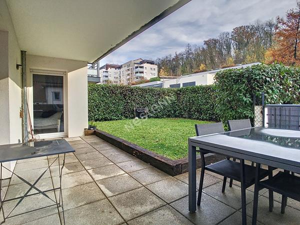 Appartement 4 pièces de 90 m² situé sur Annecy-Le-Vieux, avec une spacieuse terrasse, un jardin, un garage et une cave