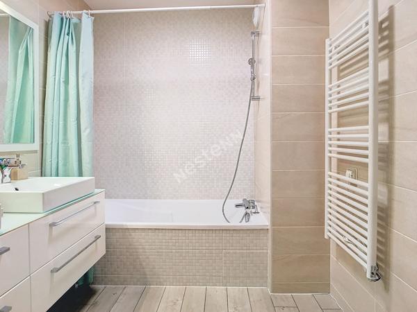 Appartement 4 pièces de 90 m² situé sur Annecy-Le-Vieux, avec une spacieuse terrasse, un jardin, un garage et une cave