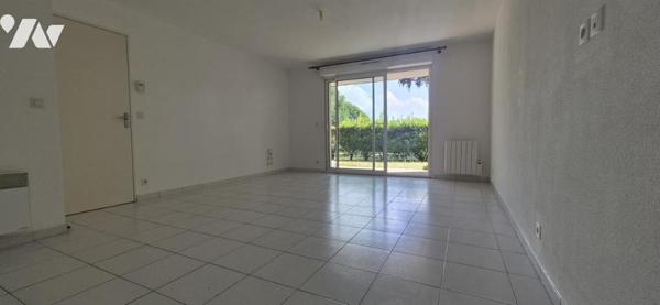 APPARTEMENT T2 RDC - TERRASSE - GARAGE ET STATIONNEMENT