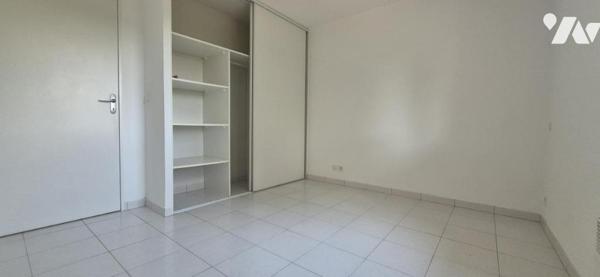 APPARTEMENT T2 RDC - TERRASSE - GARAGE ET STATIONNEMENT