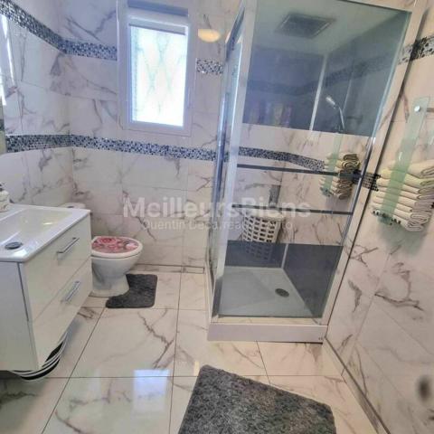 Pavillon accolée sur sous sol avec terrain