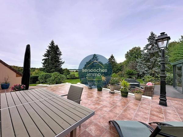 Maison avec piscine chauffée, grand terrain arboré et prestations haut de gamme à Saintigny (28480)