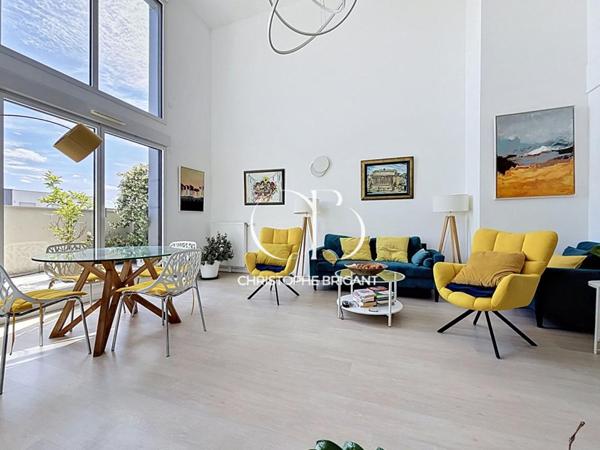 Superbe duplex  4 chambres de 117 M2 avec grande terrasse et balcons