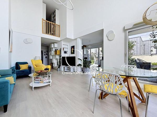 Superbe duplex  4 chambres de 117 M2 avec grande terrasse et balcons