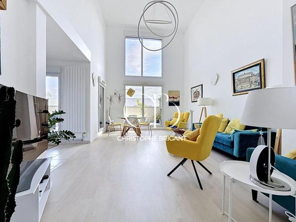Superbe duplex  4 chambres de 117 M2 avec grande terrasse et balcons