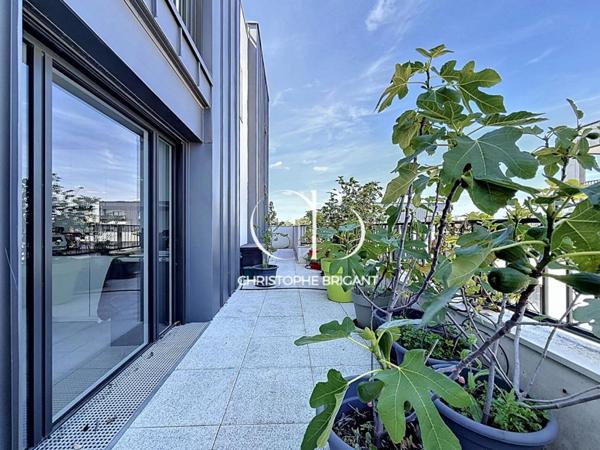 Superbe duplex  4 chambres de 117 M2 avec grande terrasse et balcons
