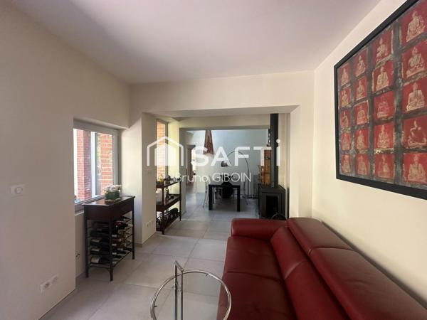 Maison de ville, 171 m², 4 chambres, jardin, dépendances, atelier et caves.