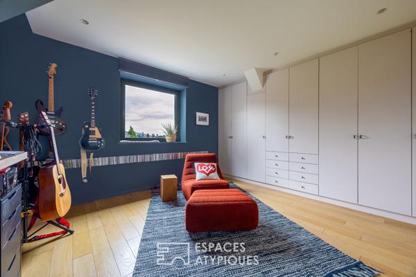 Maison d’architecte avec piscine et jardin paysager