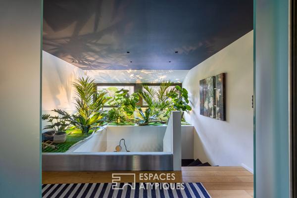 Maison d’architecte avec piscine et jardin paysager