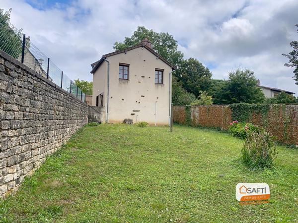 Maison de ville avec garage et jardin