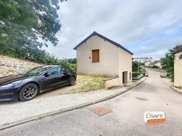 Maison de ville avec garage et jardin