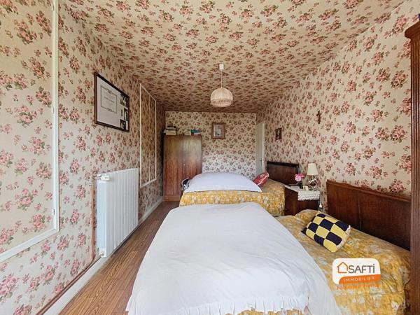 Maison de ville avec garage et jardin