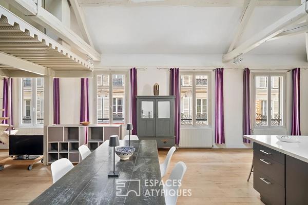 Loft en étage avec charpente apparente aux Batignolles