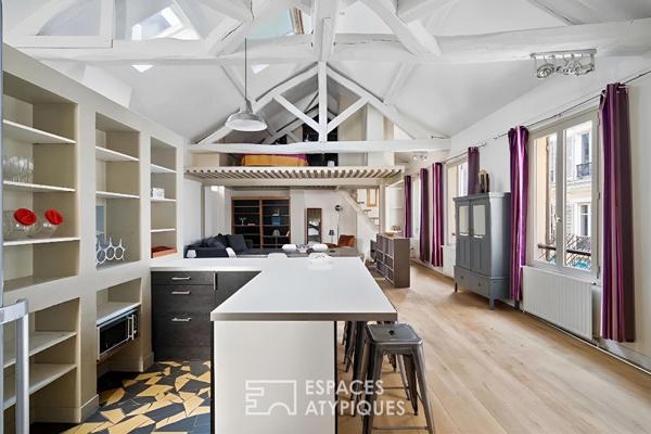 Loft en étage avec charpente apparente aux Batignolles