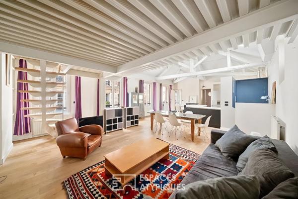 Loft en étage avec charpente apparente aux Batignolles
