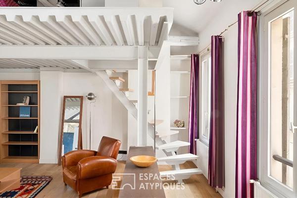 Loft en étage avec charpente apparente aux Batignolles