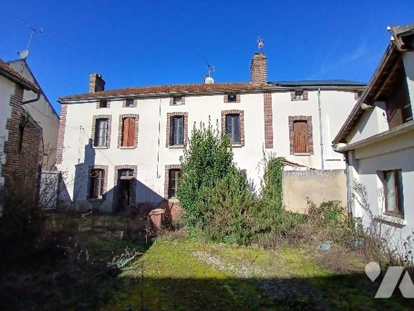 UNE MAISON D'HABITATION à fort potentiel