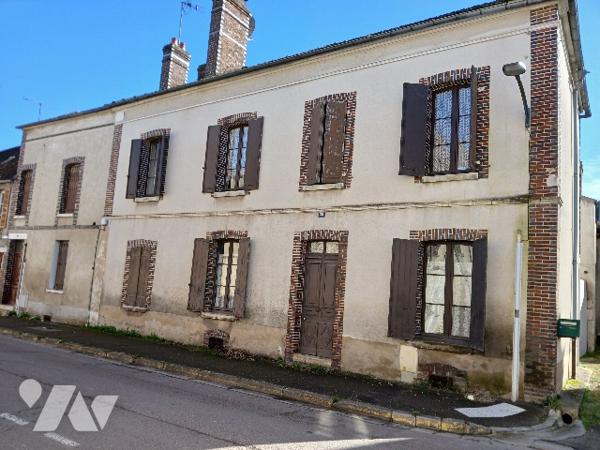 UNE MAISON D'HABITATION à fort potentiel