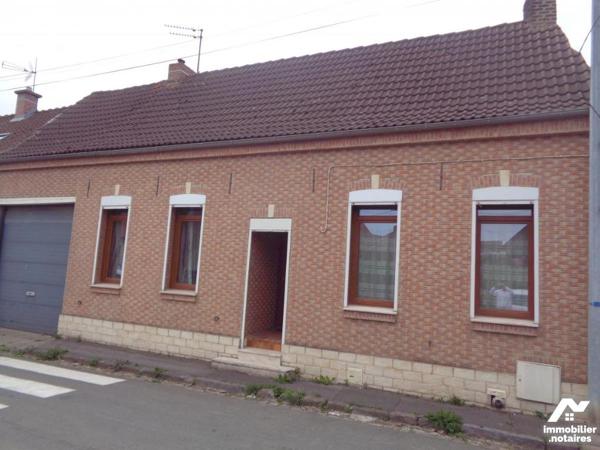 Maison en briques de 116 m² habitable bâtie sur 560 m²