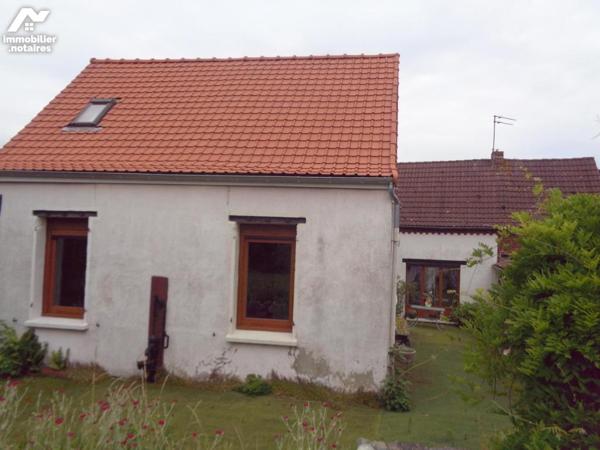 Maison en briques de 116 m² habitable bâtie sur 560 m²