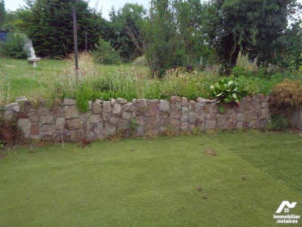 Maison en briques de 116 m² habitable bâtie sur 560 m²