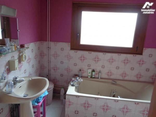 Maison en briques de 116 m² habitable bâtie sur 560 m²