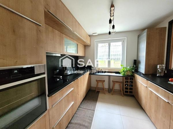 Au Calme en forêt d'Ecouen, robuste maison.