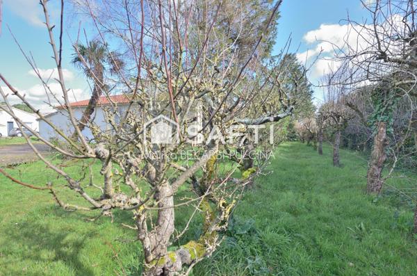 2133m² de terrain arboré, deux garages