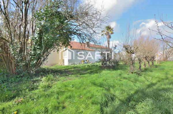 2133m² de terrain arboré, deux garages