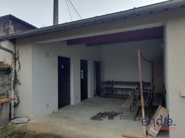 Ensemble Immobilier de 220m² avec 1500m² de terrain plein centre ville.