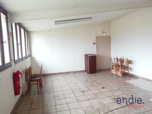 Ensemble Immobilier de 220m² avec 1500m² de terrain plein centre ville.