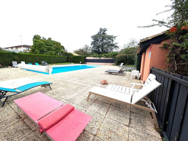 APPARTEMENT T3 en rez de jardin, d'environ 75m² avec terrasse, cave et garage