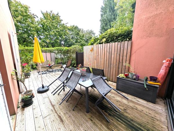 APPARTEMENT T3 en rez de jardin, d'environ 75m² avec terrasse, cave et garage