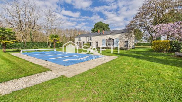 Longère de caractère avec piscine et parc arboré