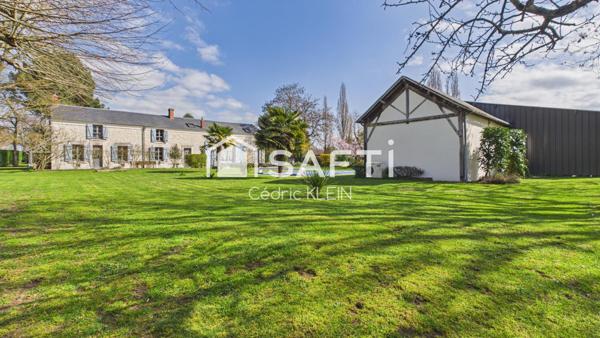 Longère de caractère avec piscine et parc arboré