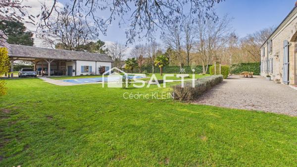 Longère de caractère avec piscine et parc arboré