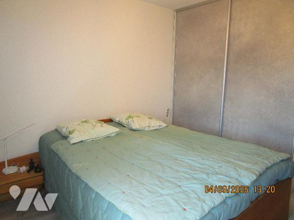 Proche centre ville : Bel appartement de type 4 situé au 1er étage,  avec garage , cave et balcons