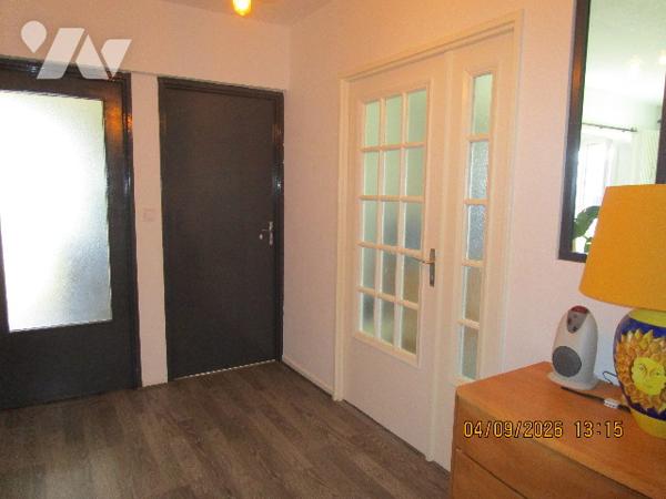 Proche centre ville : Bel appartement de type 4 situé au 1er étage,  avec garage , cave et balcons