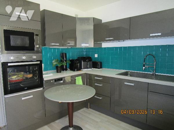 Proche centre ville : Bel appartement de type 4 situé au 1er étage,  avec garage , cave et balcons